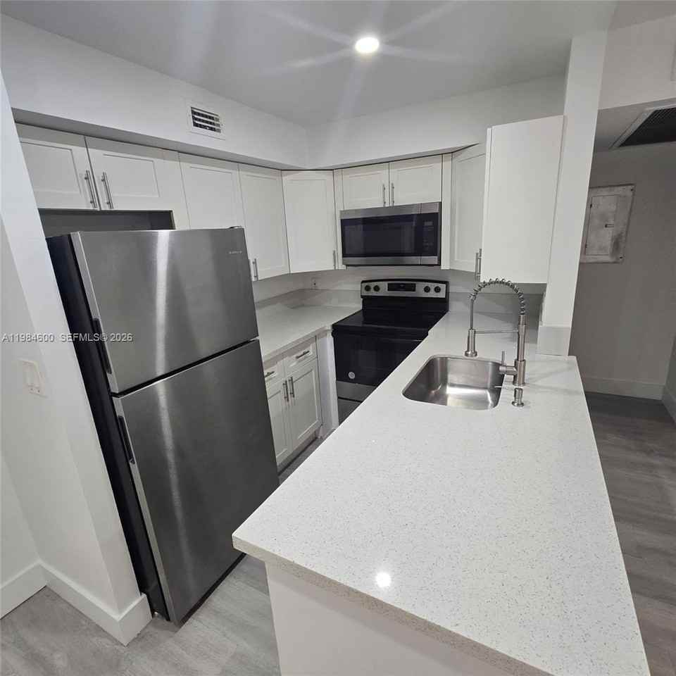 10020 Winding Lake Rd #104 - Photo 7 of 21