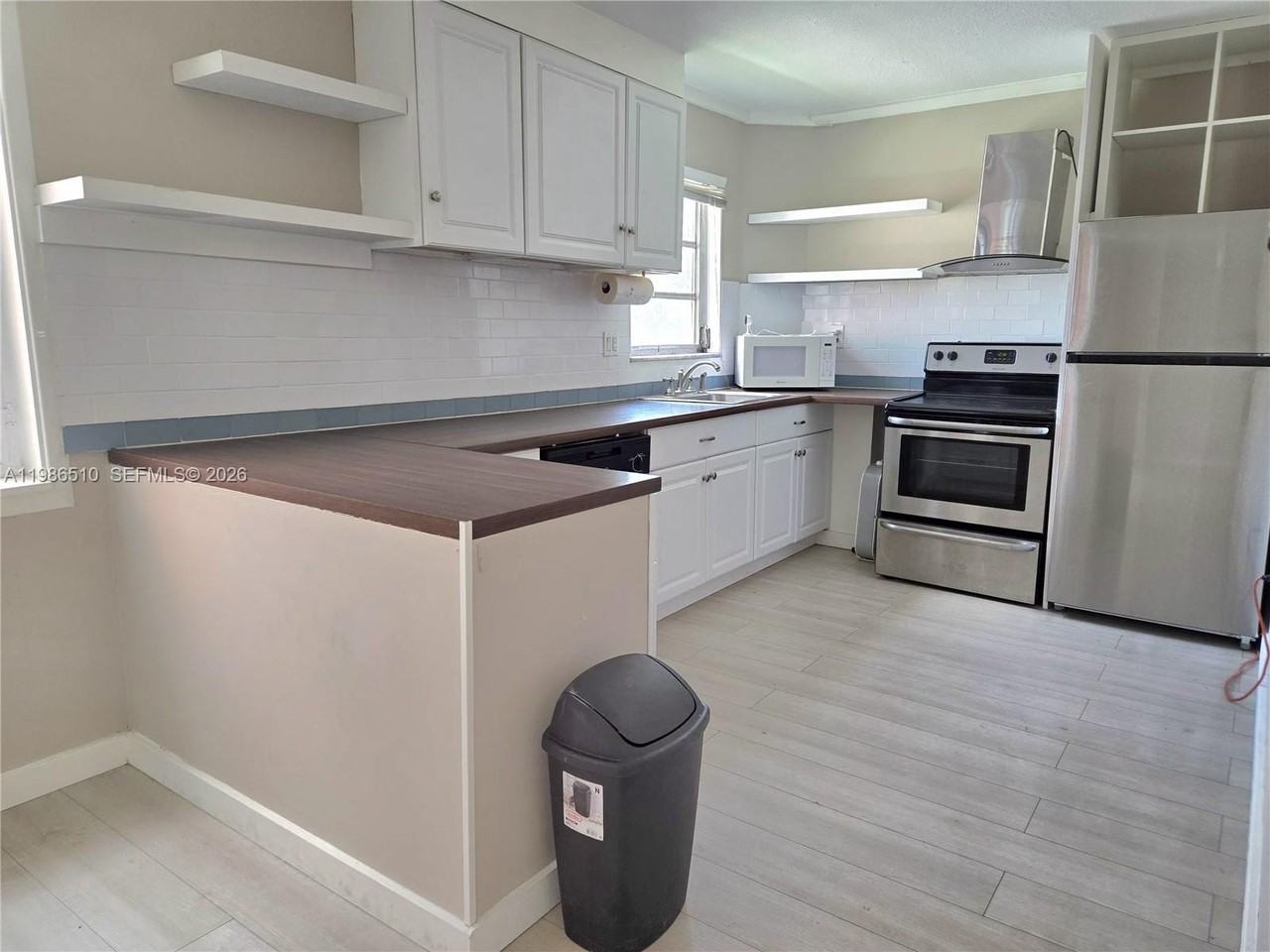 1700 Ne 191st St #100 - Photo 3 of 22