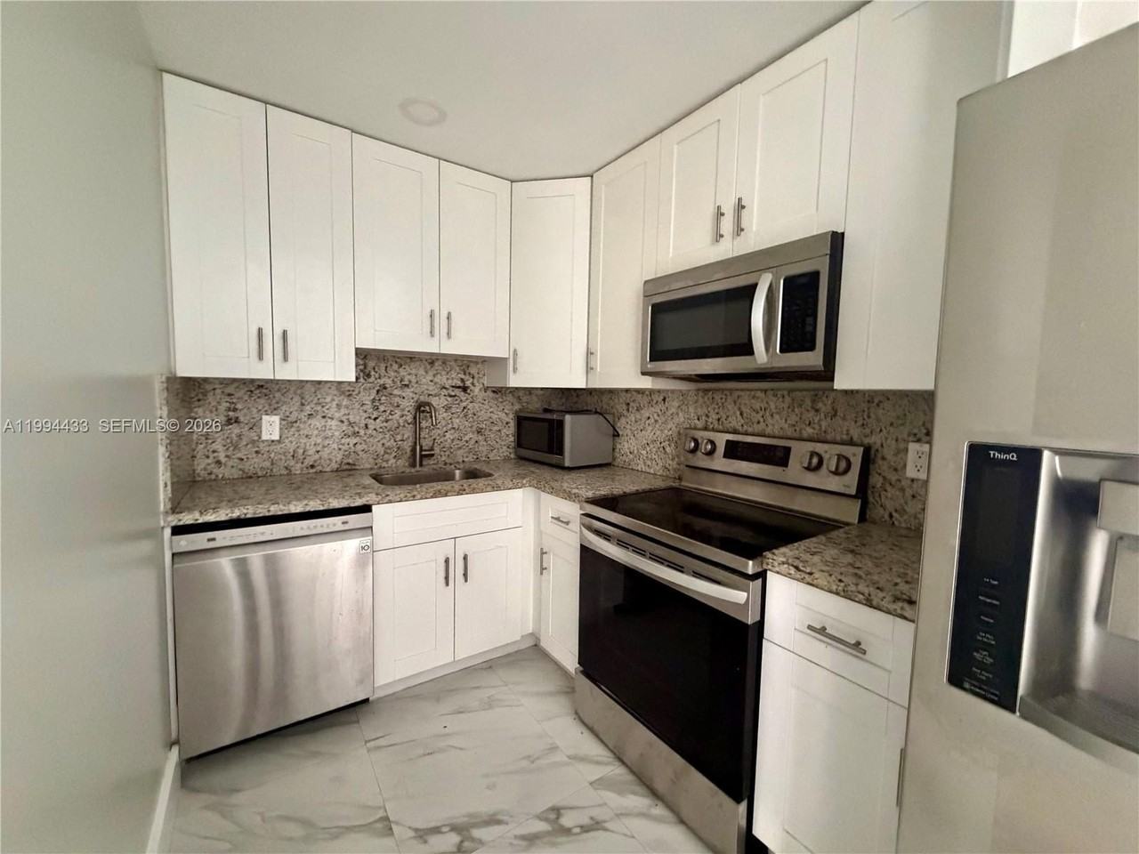 488 Ne 18th Ave #103 - Photo 4 of 21