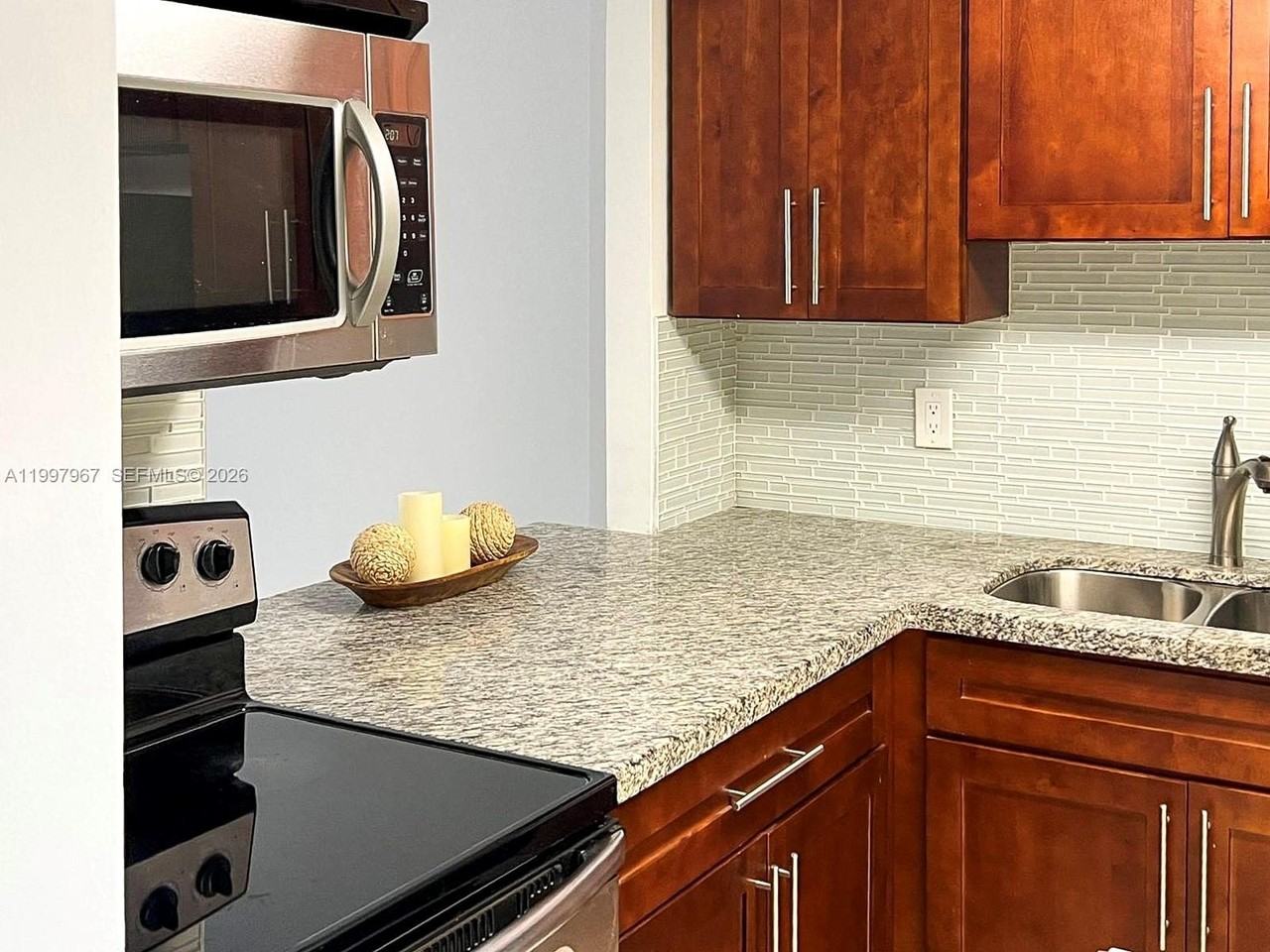 211 Ne 8th Ave #107 - Photo 2 of 18