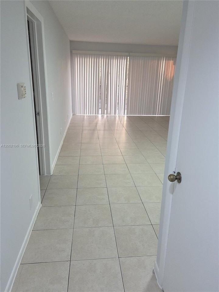 8871 Wiles Rd #208 - Photo 4 of 16