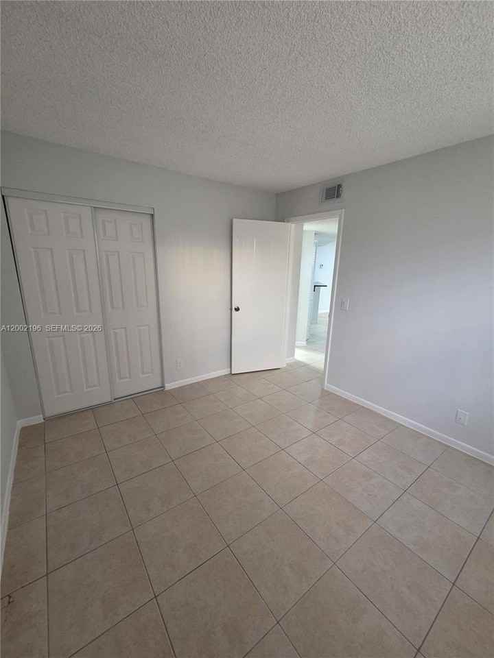 8871 Wiles Rd #208 - Photo 5 of 16