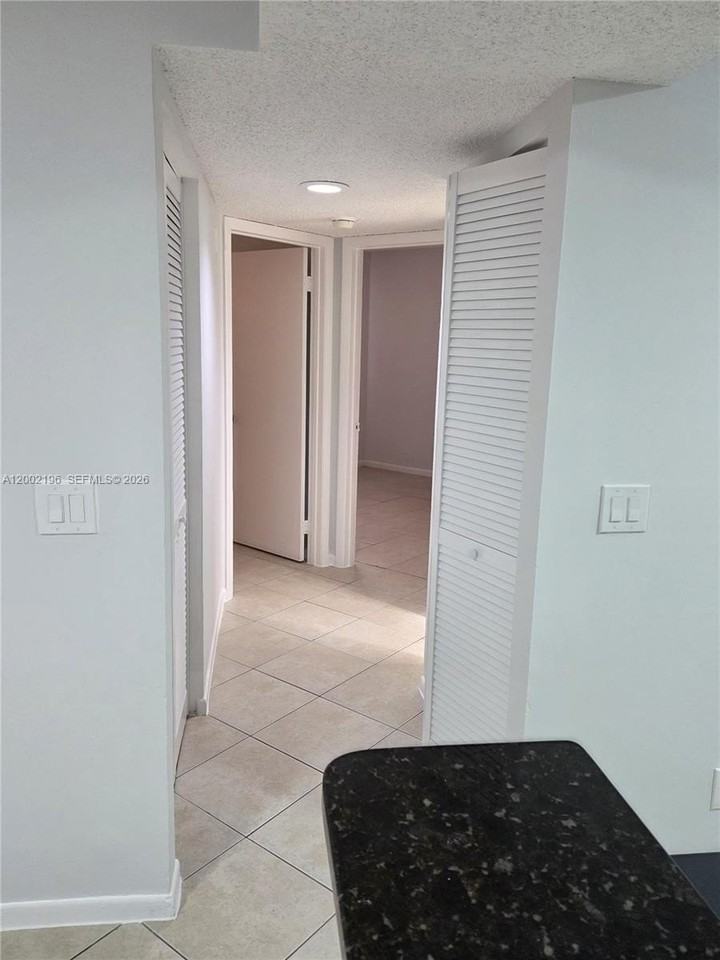 8871 Wiles Rd #208 - Photo 6 of 16