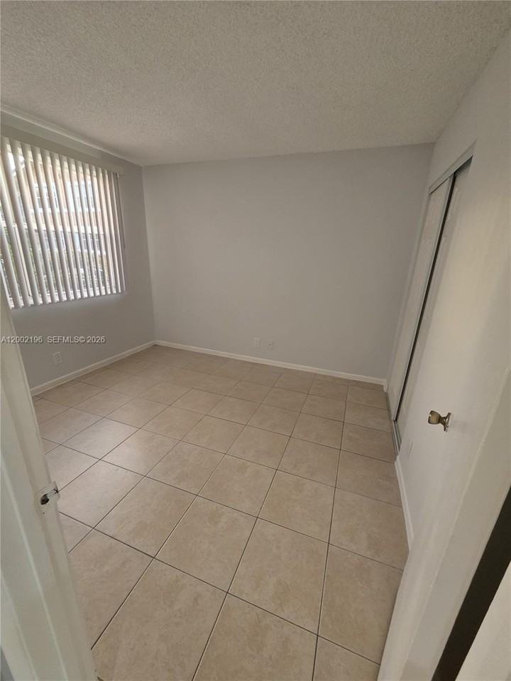 8871 Wiles Rd #208 - Photo 7 of 16