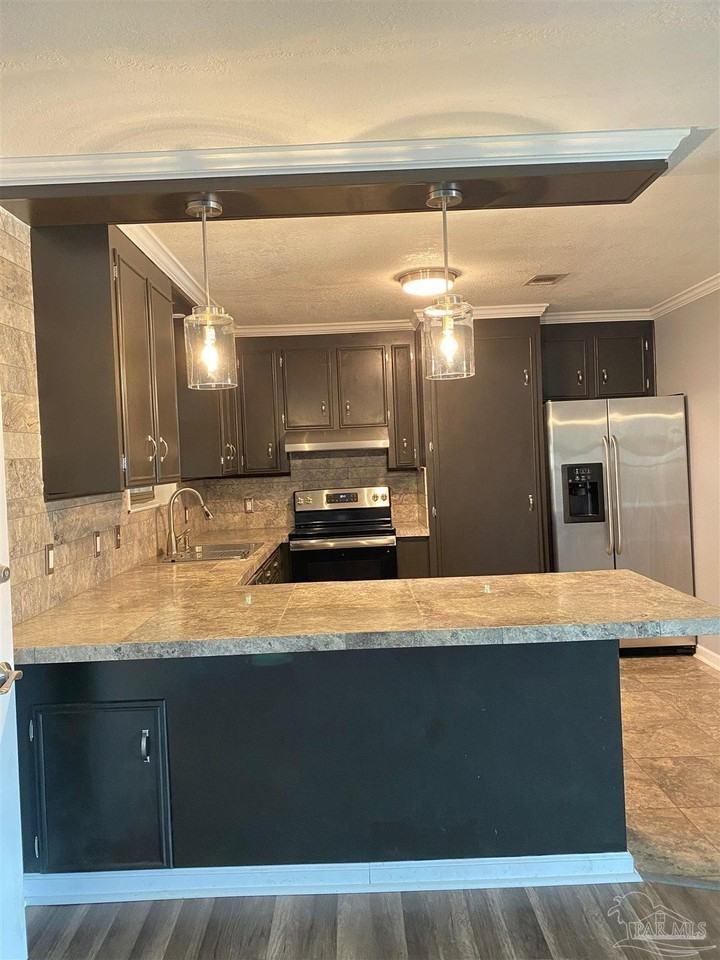 3308 Pine Forest Rd - Photo 2 of 4