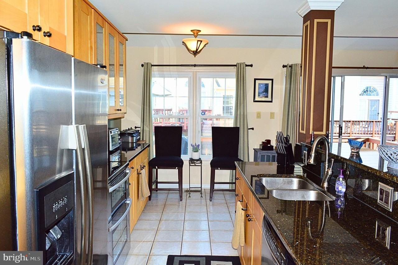 7027 Bentley Mill Pl - Photo 7 of 33