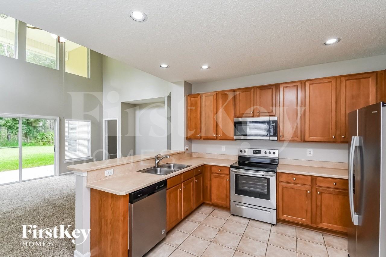 3180 Wandering Oaks Dr - Photo 6 of 15