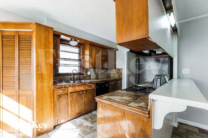 8921 E 90th Ter - Photo 6 of 15