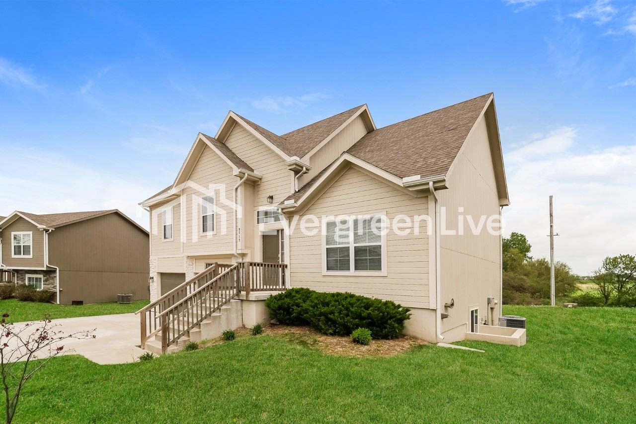 9712 E 219th Cir - Photo 2 of 15