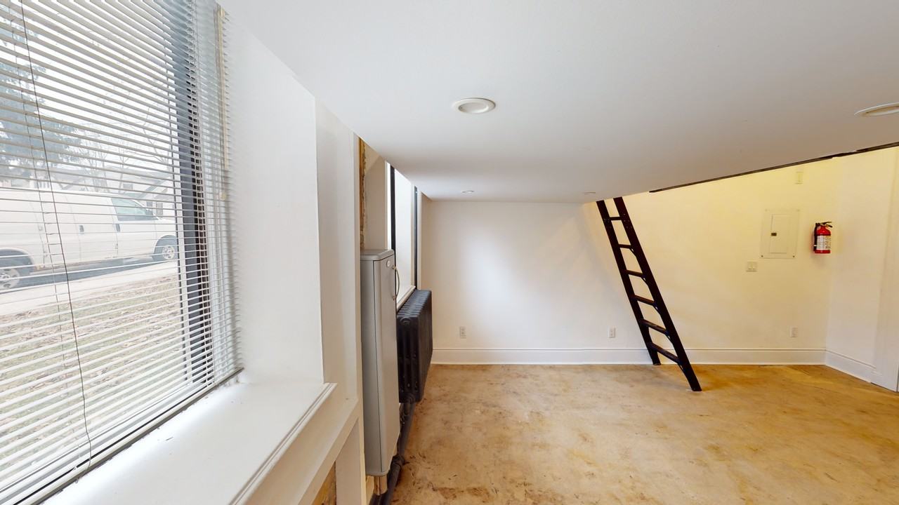 1152 Gerrard St E - Photo 6 of 32