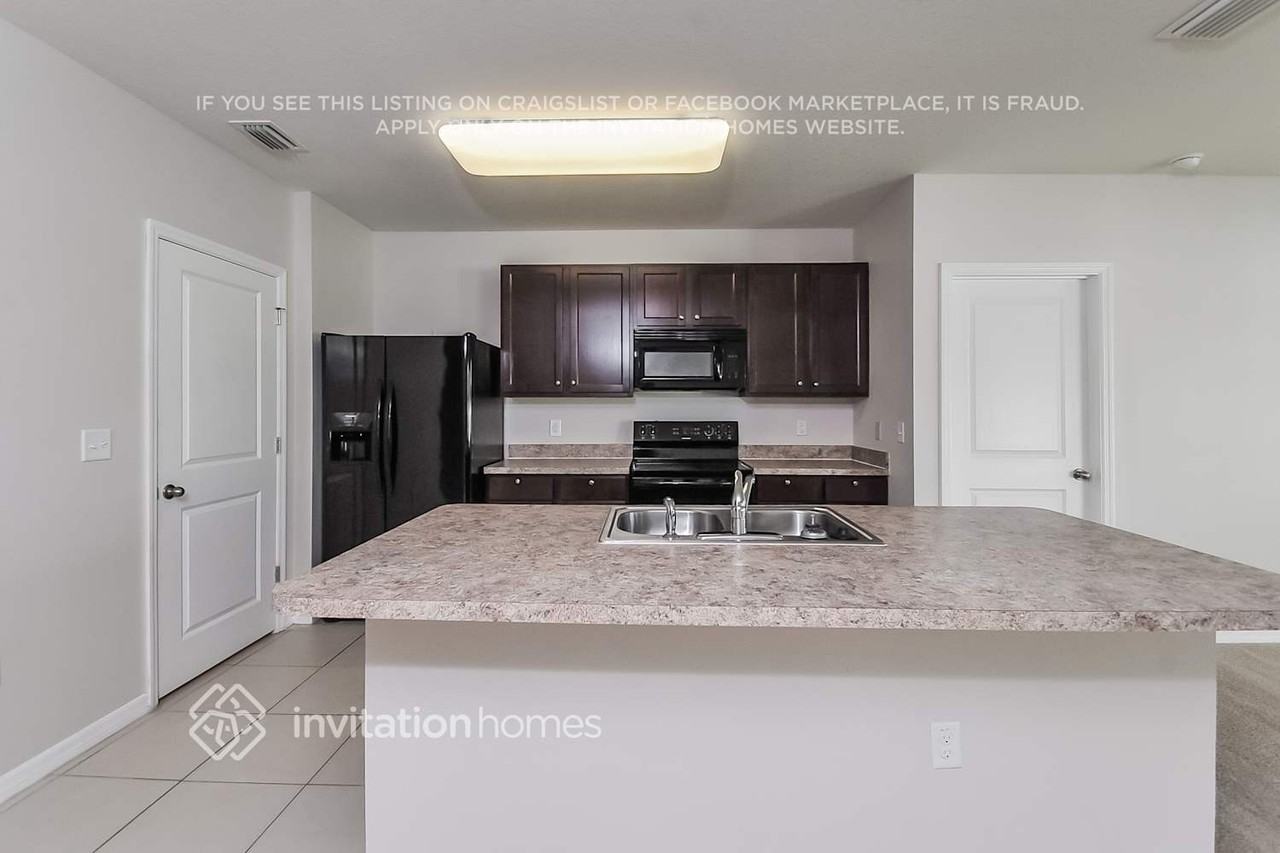 10028 Geese Trail Cir - Photo 4 of 16