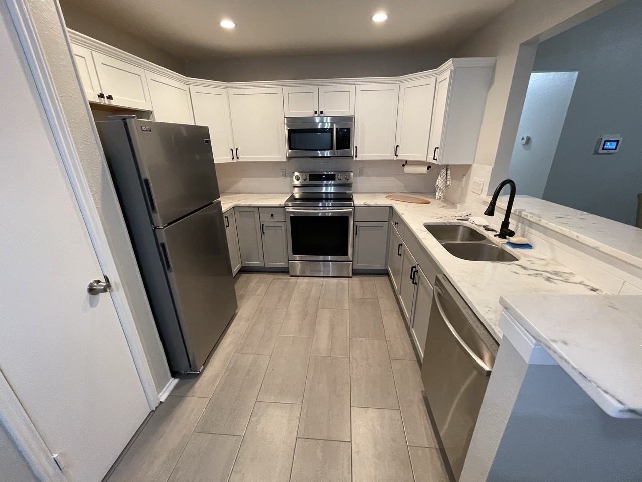 10150 Woodtrail - Photo 2 of 10