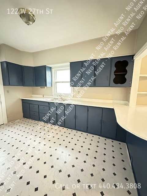 122 W 27th St - Photo 2 of 9