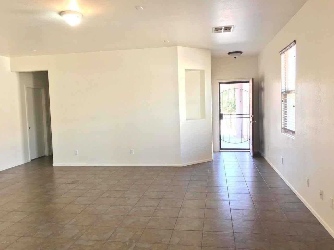 7323 W St Charles Ave - Photo 2 of 16