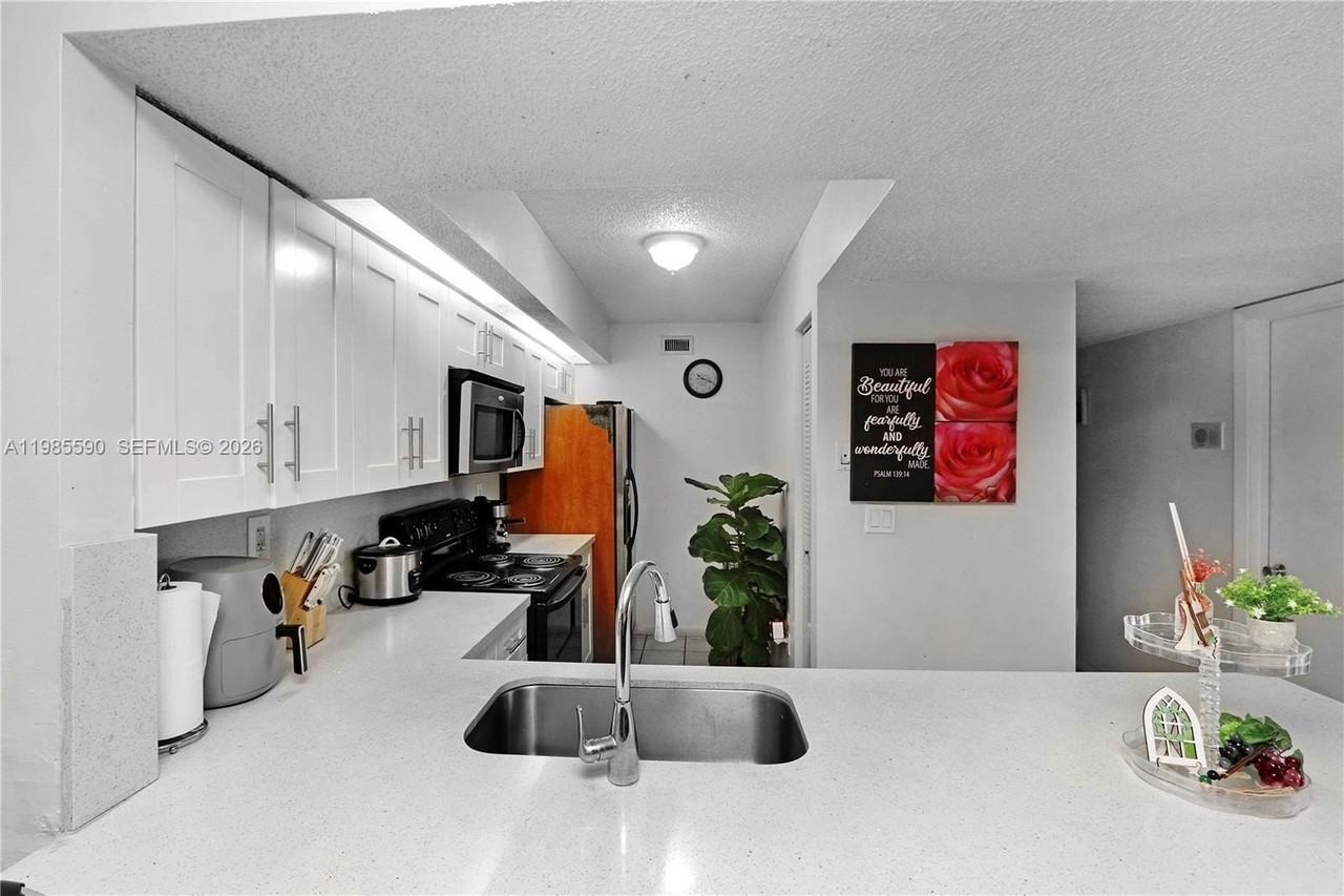 8640 Sw 212th St #303 - Photo 2 of 23