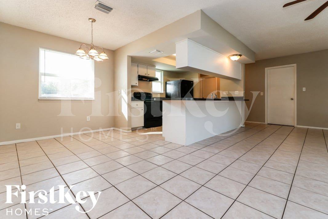 7704 Riverdale Dr - Photo 4 of 15