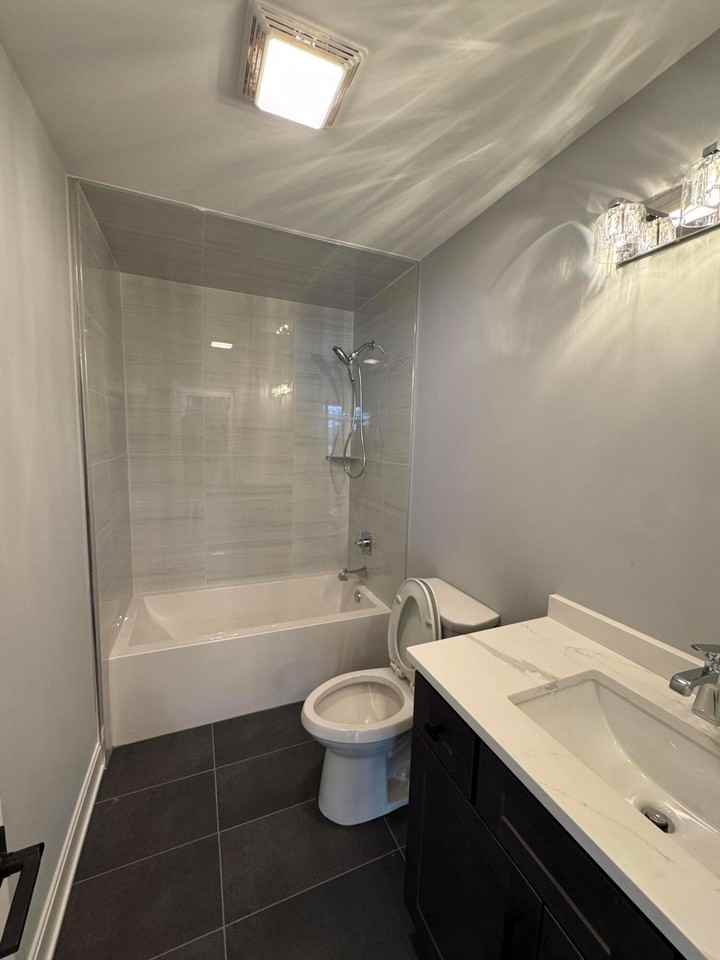 7718 E 108th Ave - Photo 3 of 15