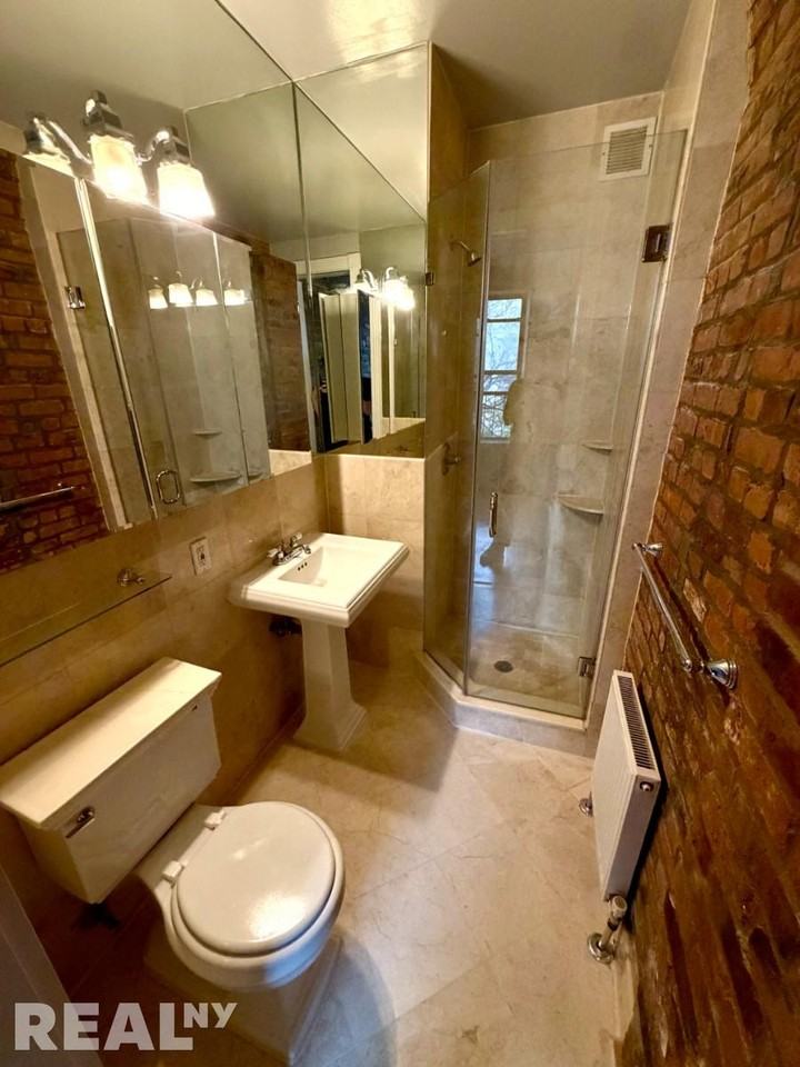 E 1st St #3R - Photo 6 of 8