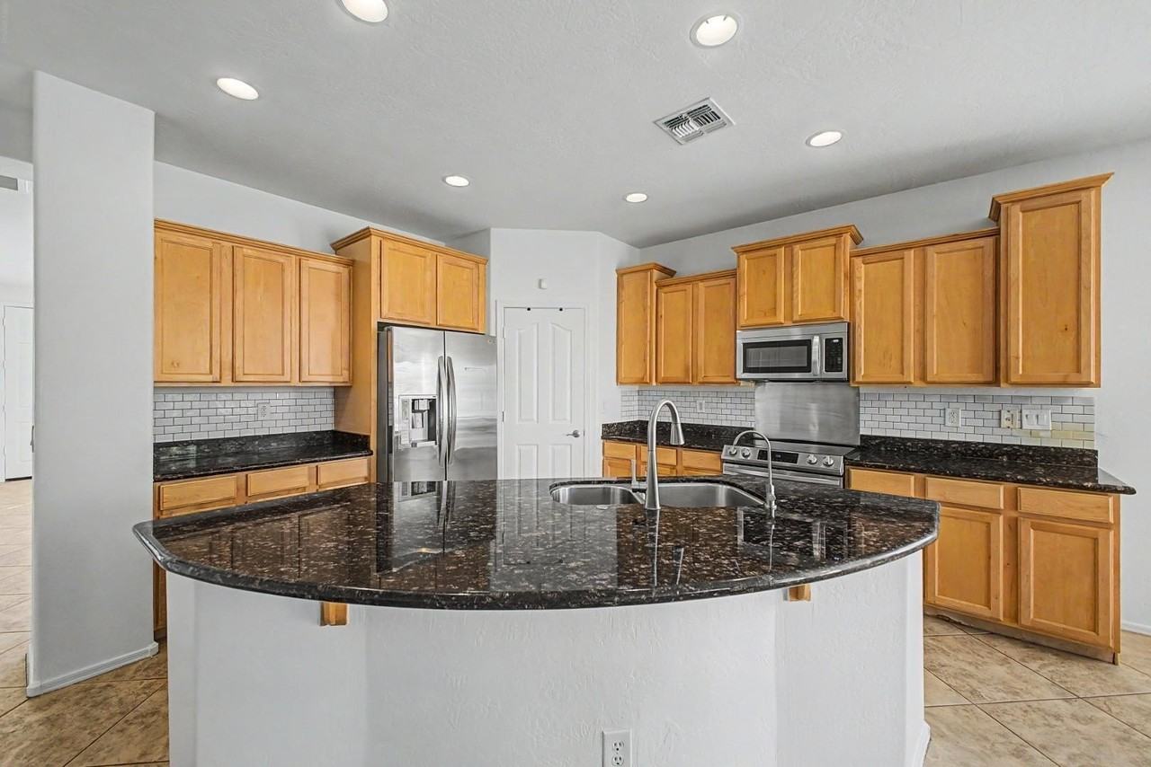 6630 W Harwell Rd - Photo 6 of 33