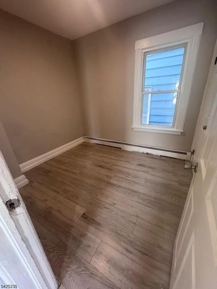 487 E 24th St - Photo 5 of 7