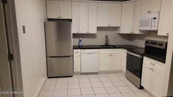 featured image of 115 Amberly Dr #H