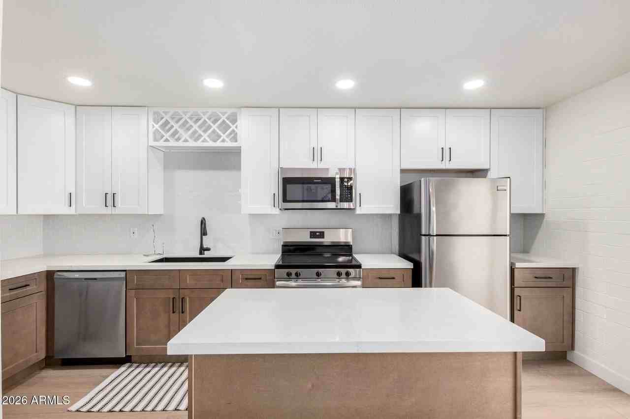 4848 N Woodmere Fairway #15 - Photo 6 of 34