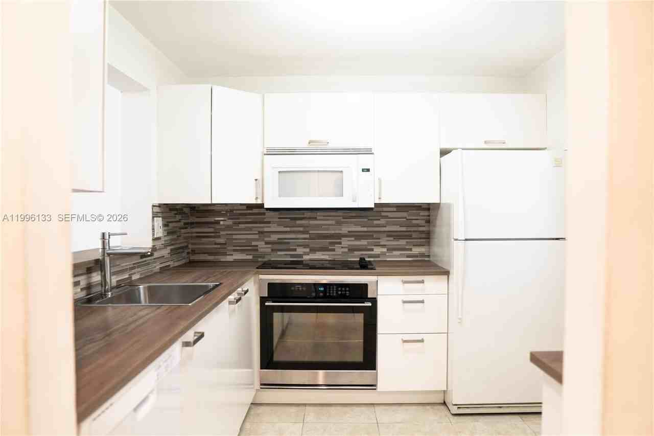 10865 Sw 112th Ave #203 - Photo 2 of 20