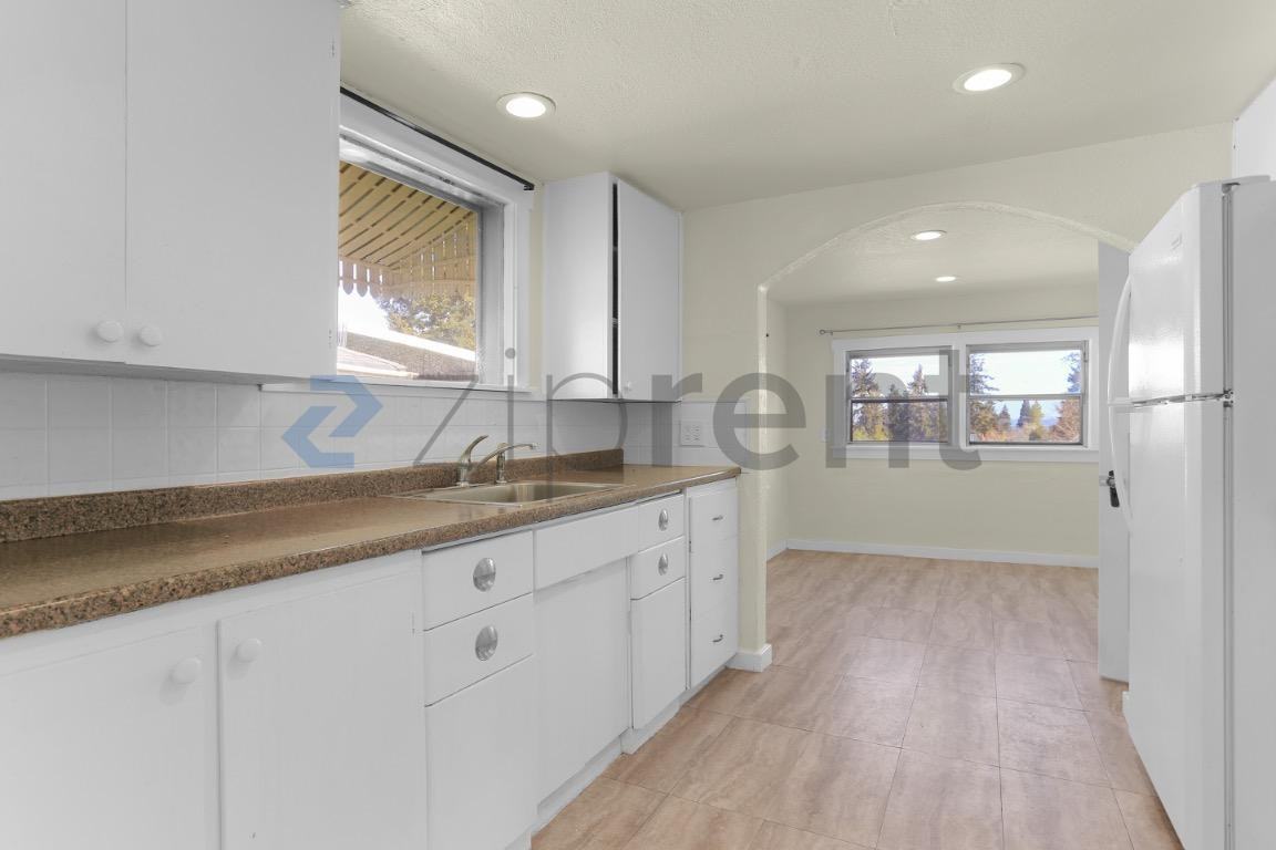 5526 S Avon St - Photo 6 of 16