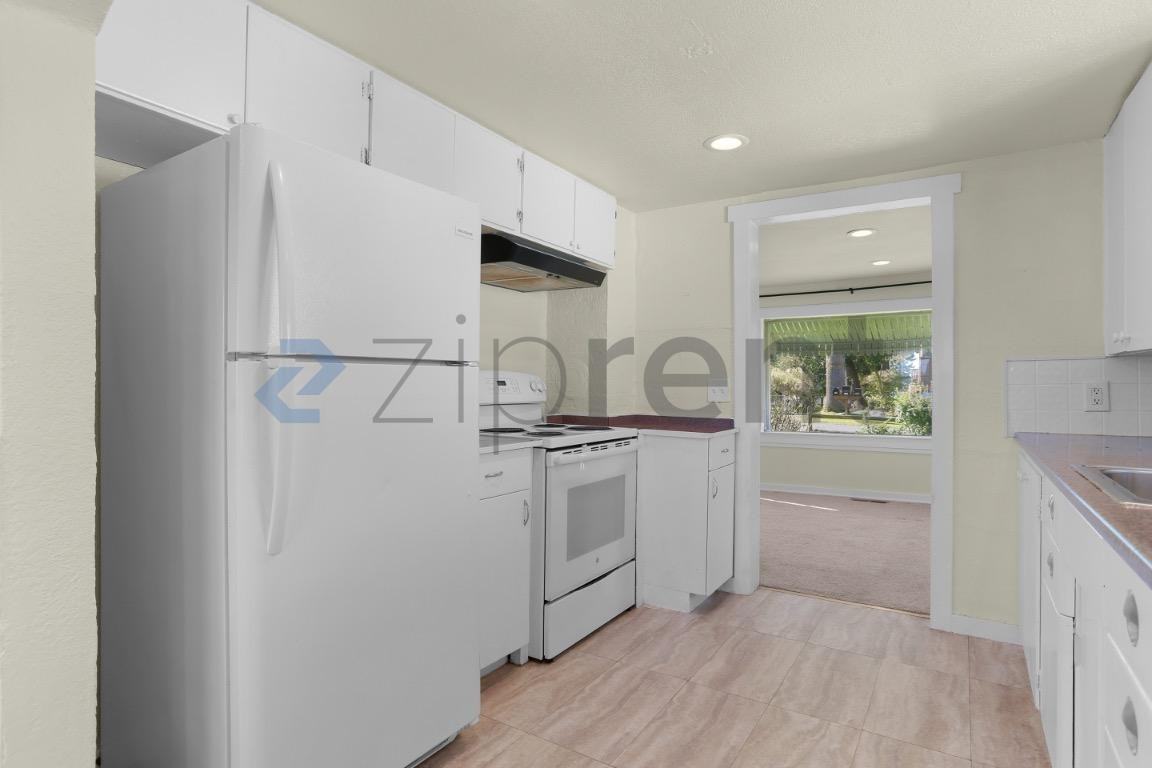 5526 S Avon St - Photo 7 of 16