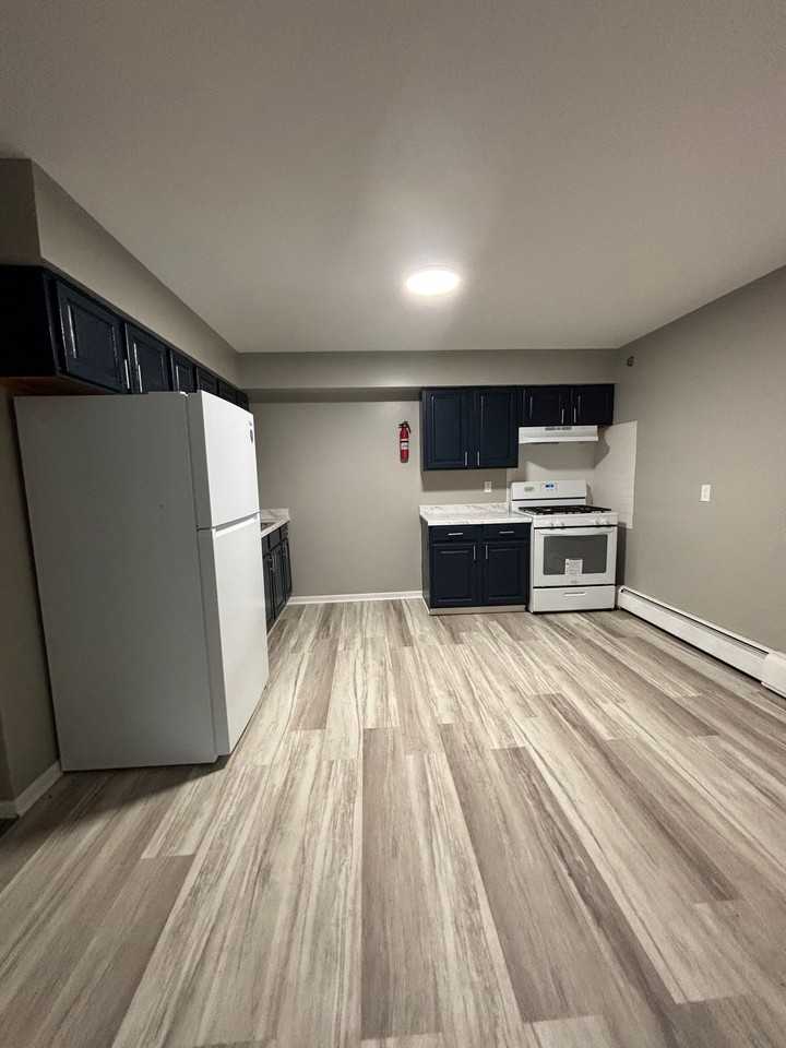 NEW MANAGEMENT. NEW STANDARDS. NOW LEASING. - Photo 3 of 20