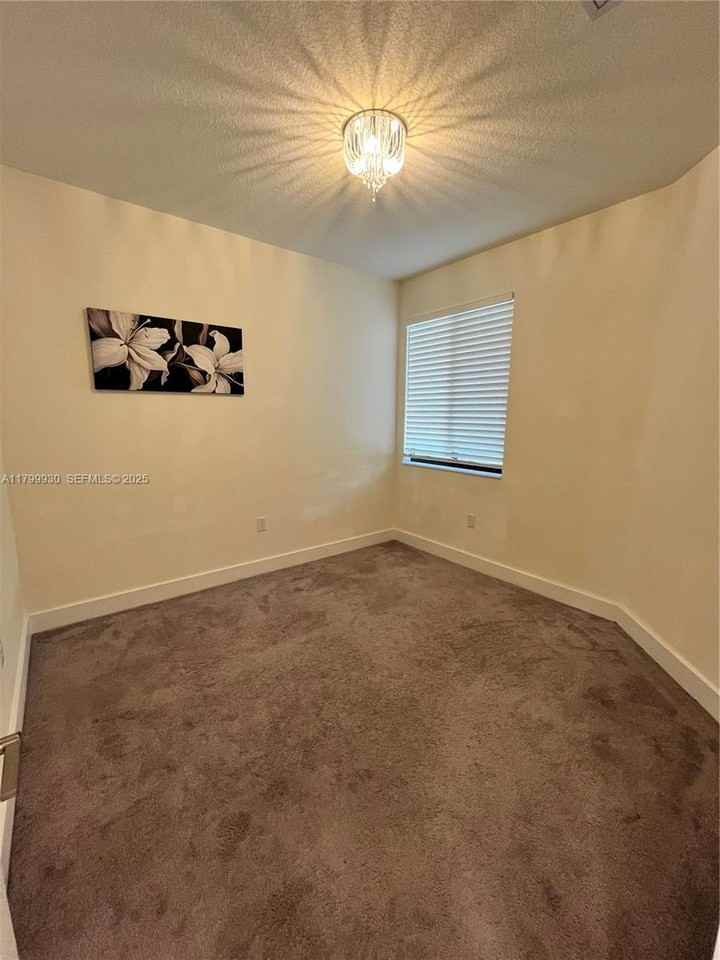 4745 Northwest 83rd Parkway - Photo 4 of 20