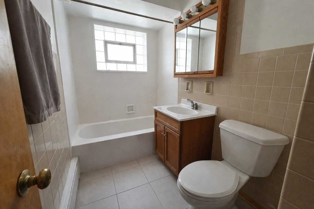 7126 W Jarvis Ave #1 - Photo 6 of 14