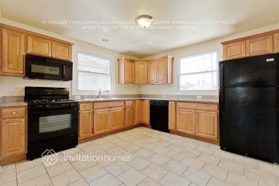 7720 Mason Ave - Photo 4 of 11