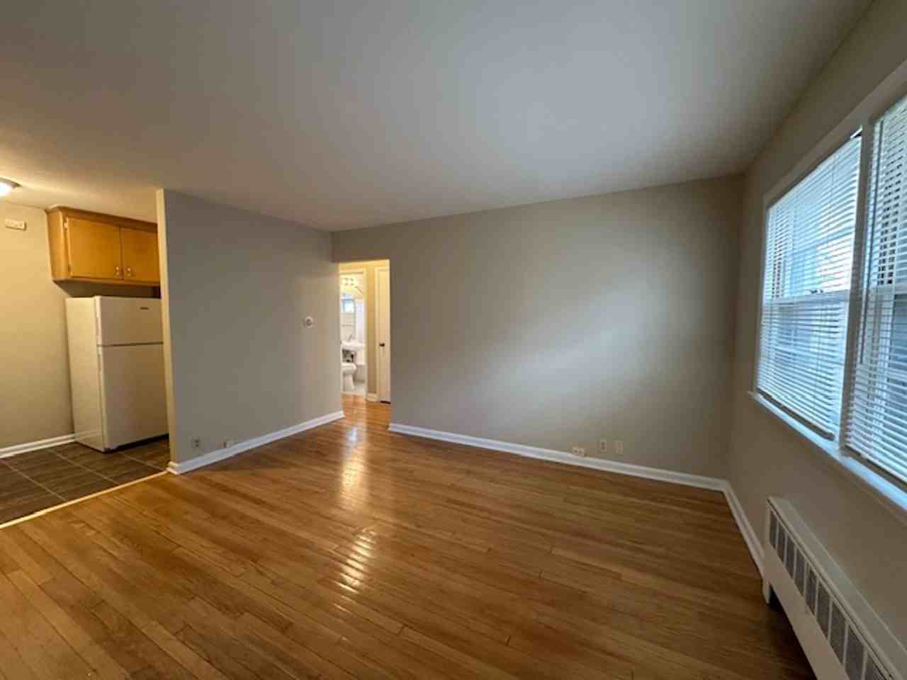 Cozy 1BR in Riverwest $895 – Heat Included | Hardwood Floors | Storage + Laundry - Photo 2 of 9