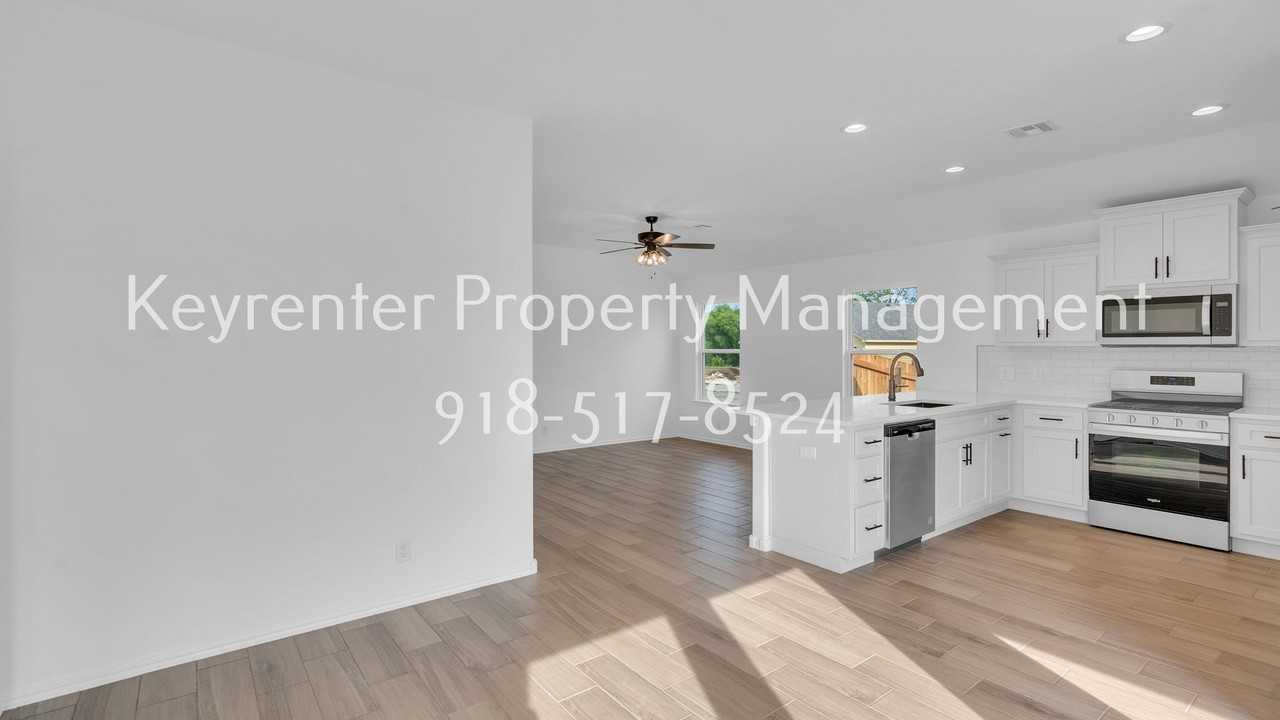 9309 N 115th East Ave - Photo 4 of 19