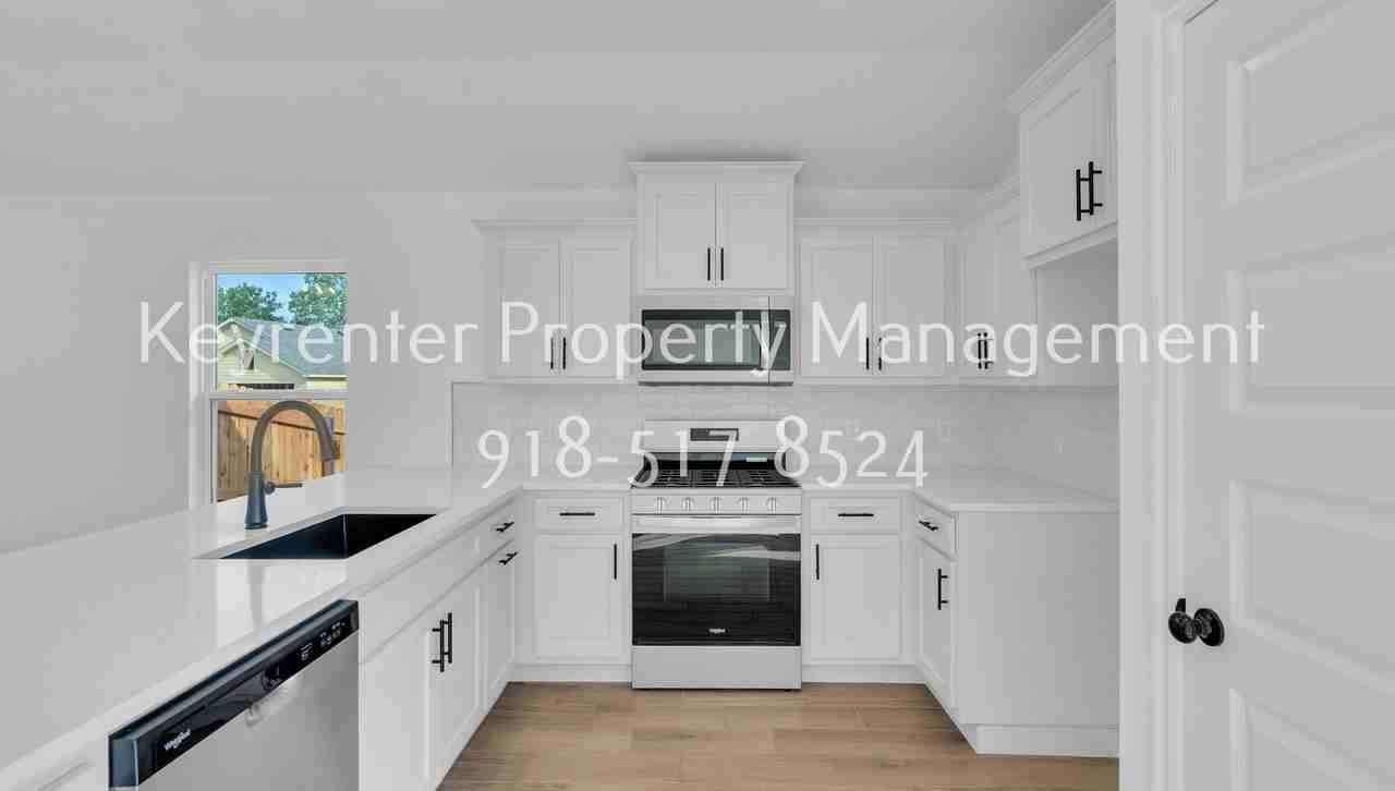9309 N 115th East Ave - Photo 5 of 19