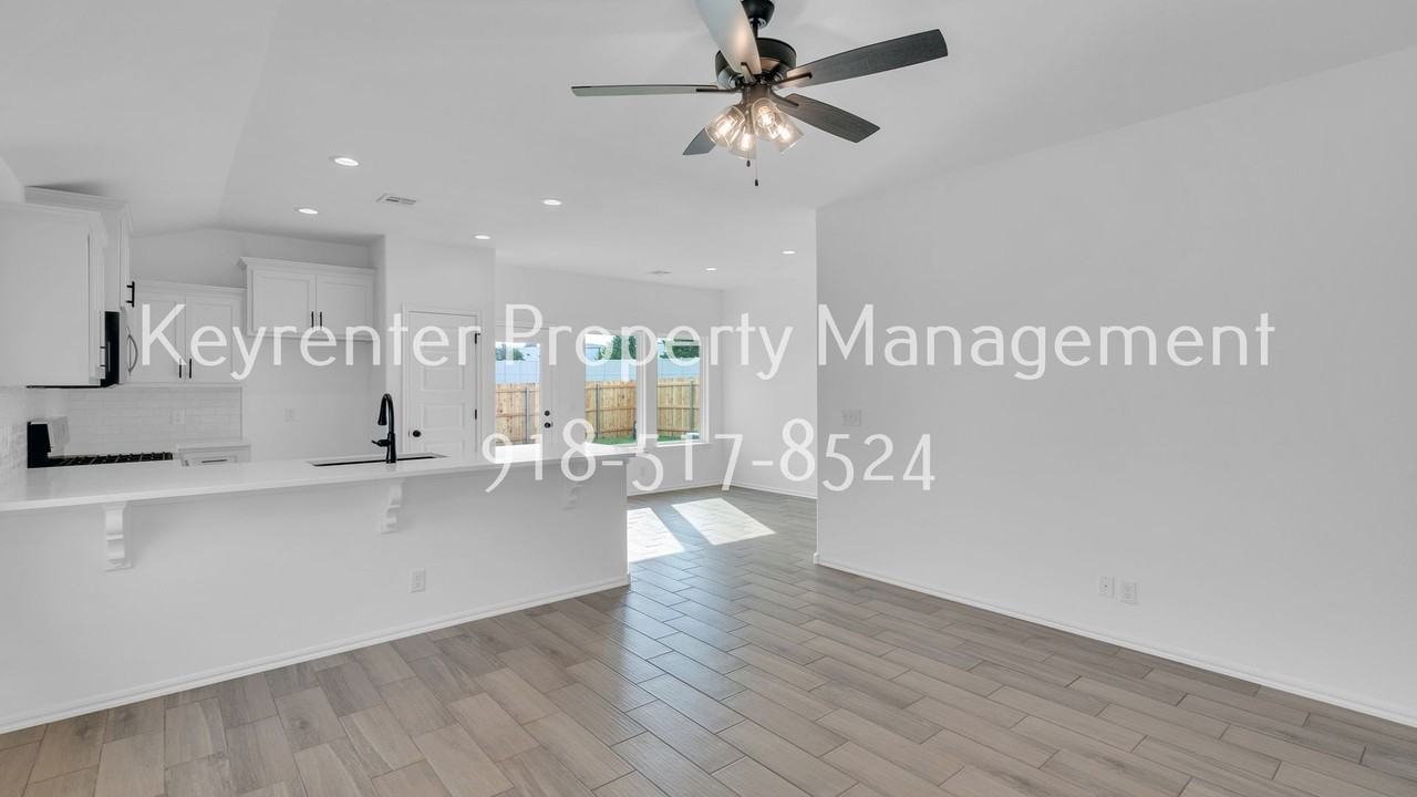 9309 N 115th East Ave - Photo 6 of 19