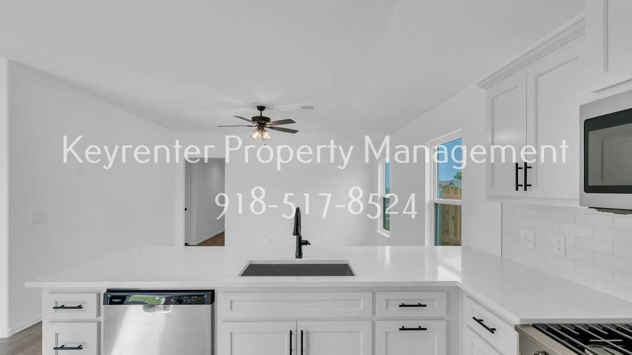 9309 N 115th East Ave - Photo 7 of 19