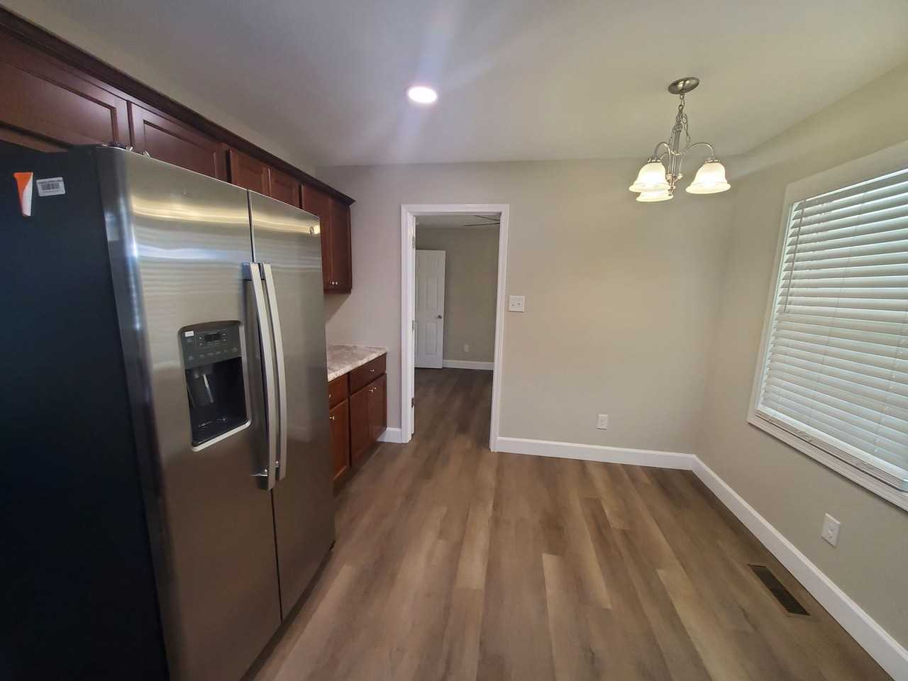 1208 Hillsboro St - Photo 4 of 20