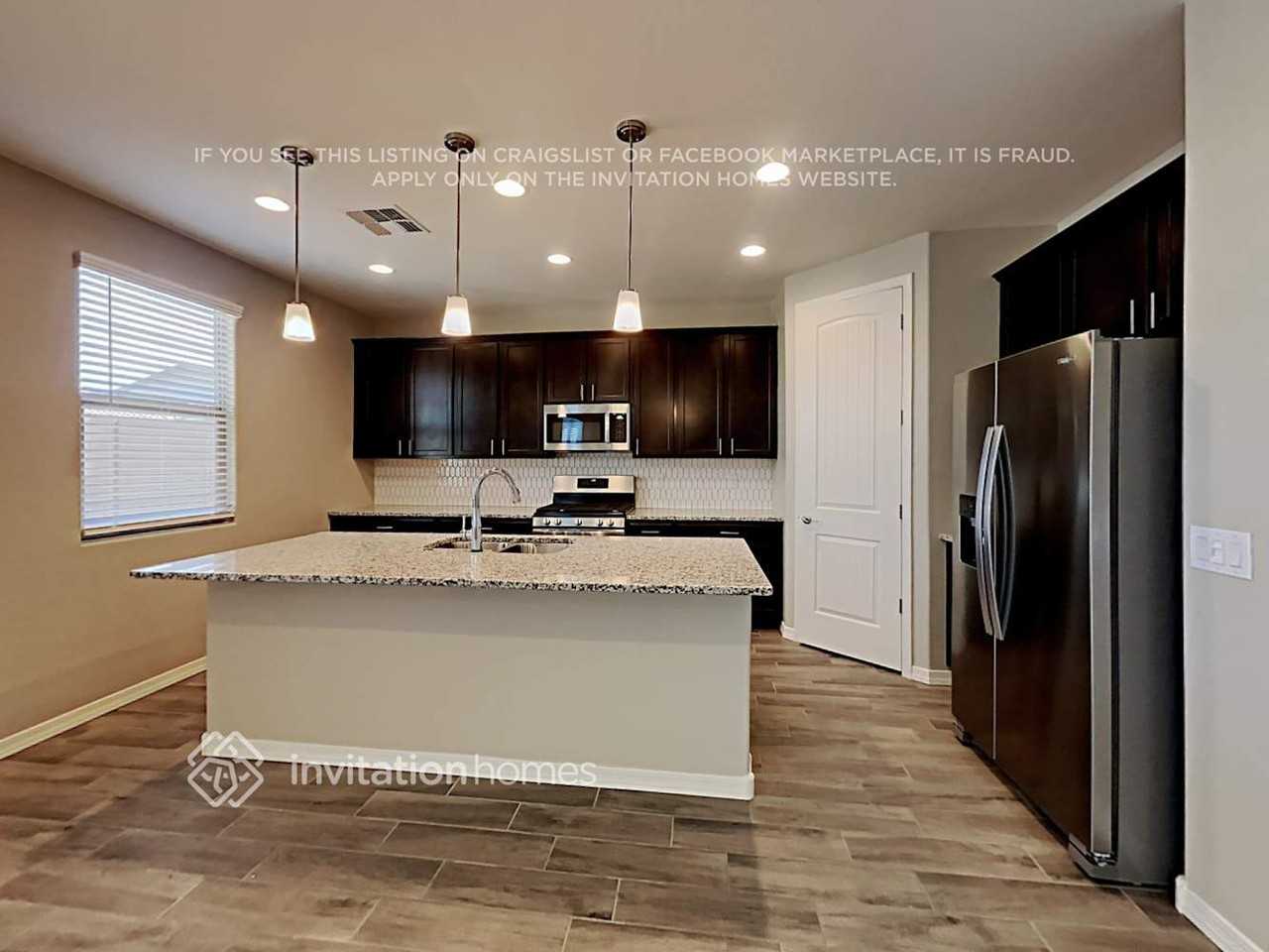 2109 N 209th Ln - Photo 7 of 20