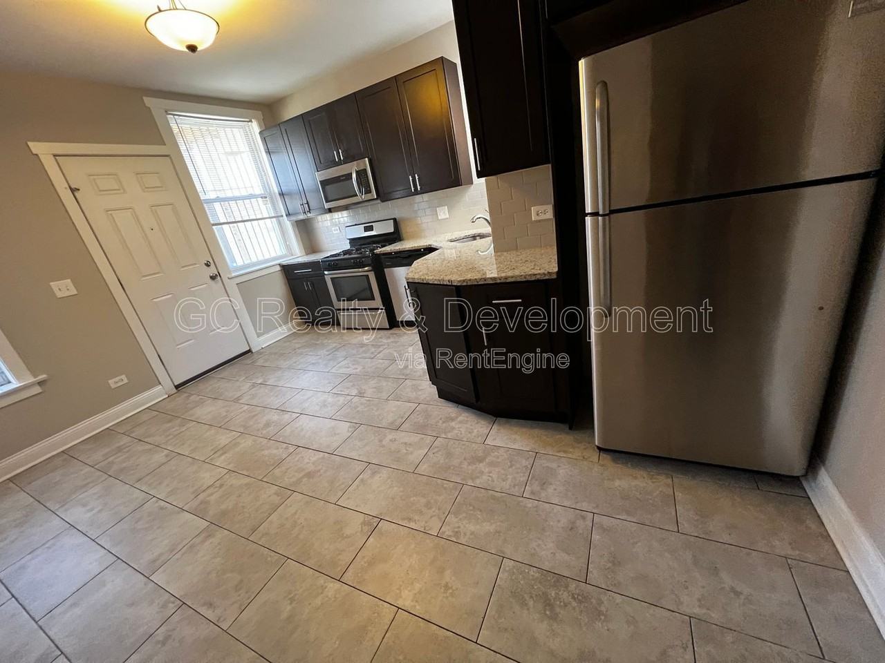 6031 S Eberhart Ave #2 - Photo 3 of 19