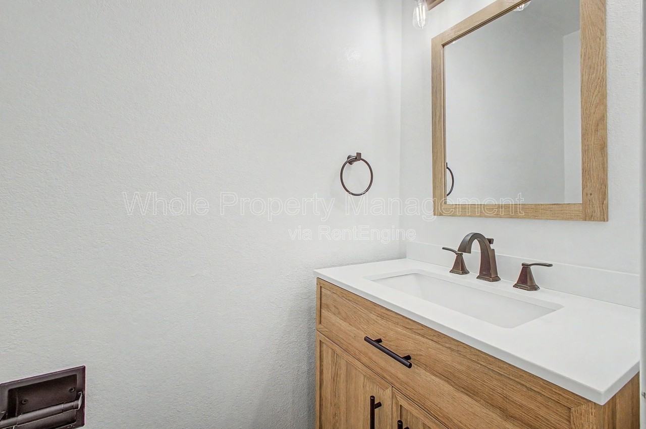 9037 E Nassau Ave - Photo 5 of 20