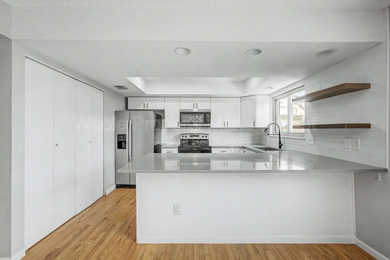 9037 E Nassau Ave - Photo 7 of 20