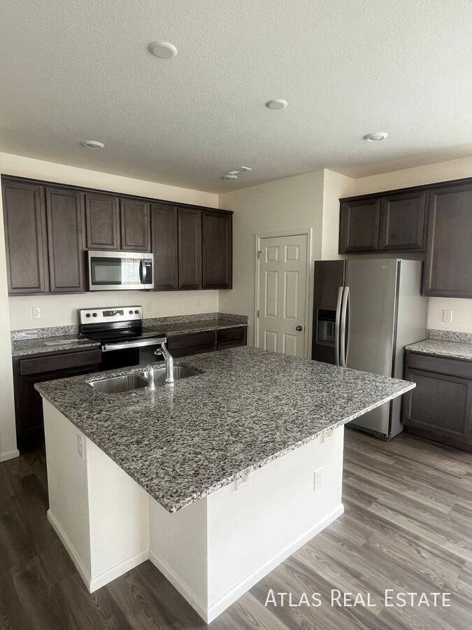 17704 E 103rd Ave - Photo 5 of 36