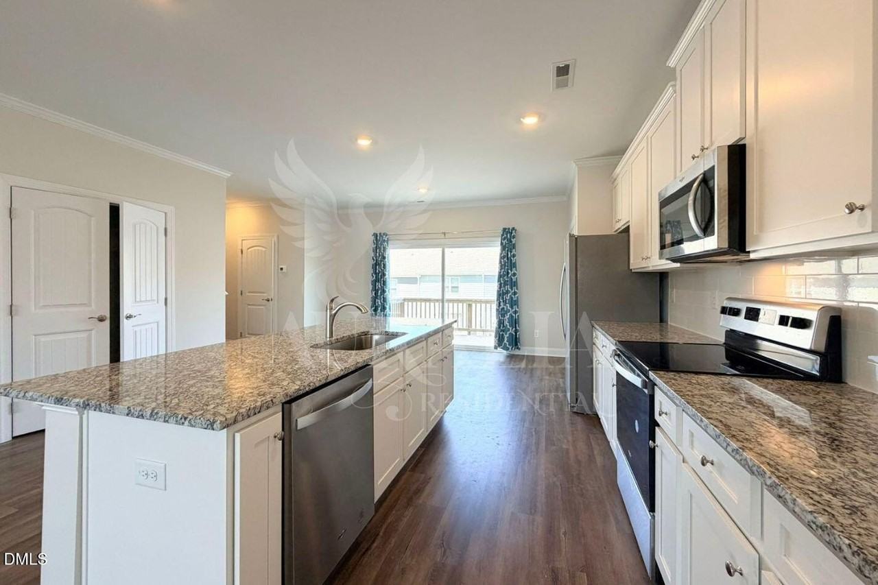 6935 Point Bar Pl - Photo 4 of 35