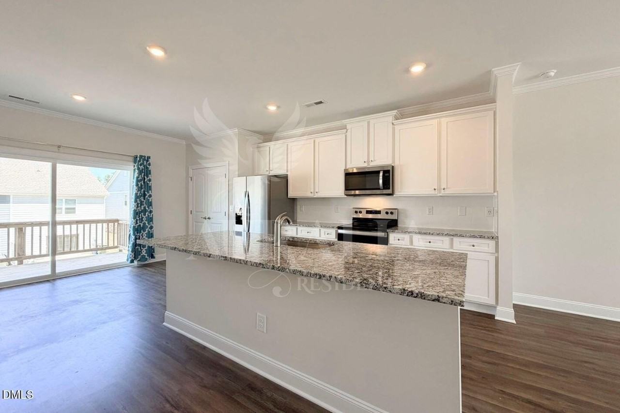 6935 Point Bar Pl - Photo 6 of 35