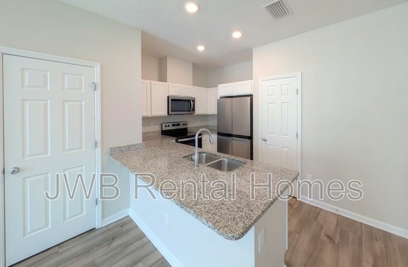 9850 Fiddleback Ln - Photo 2 of 26