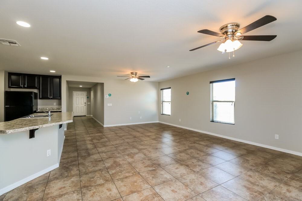 10826 E Calypso Ave - Photo 5 of 16