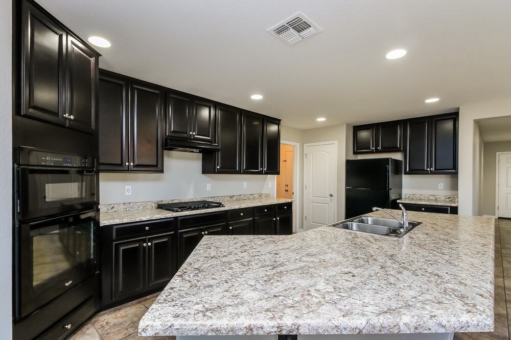 10826 E Calypso Ave - Photo 7 of 16