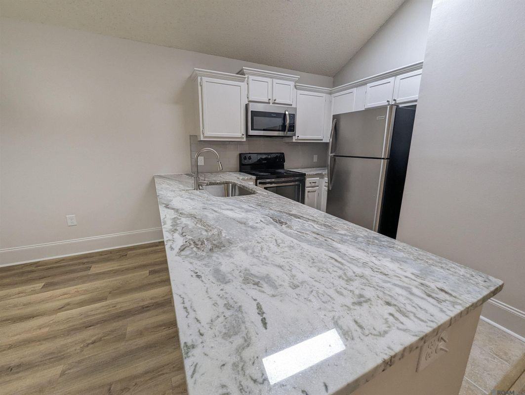 11011 Cal Rd ##102 - Photo 2 of 13